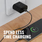 IEVO 45W PD fast charger plugged into wall socket charging a smartphone on wooden desk